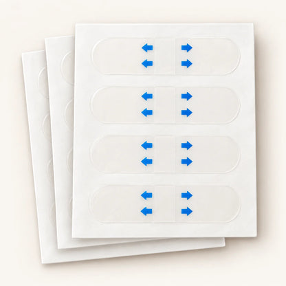 Clear face-lifting strips on staggered white backing sheets with blue-arrow protective liners.