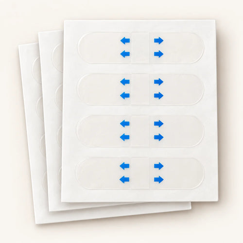 Clear face-lifting strips on staggered white backing sheets with blue-arrow protective liners.